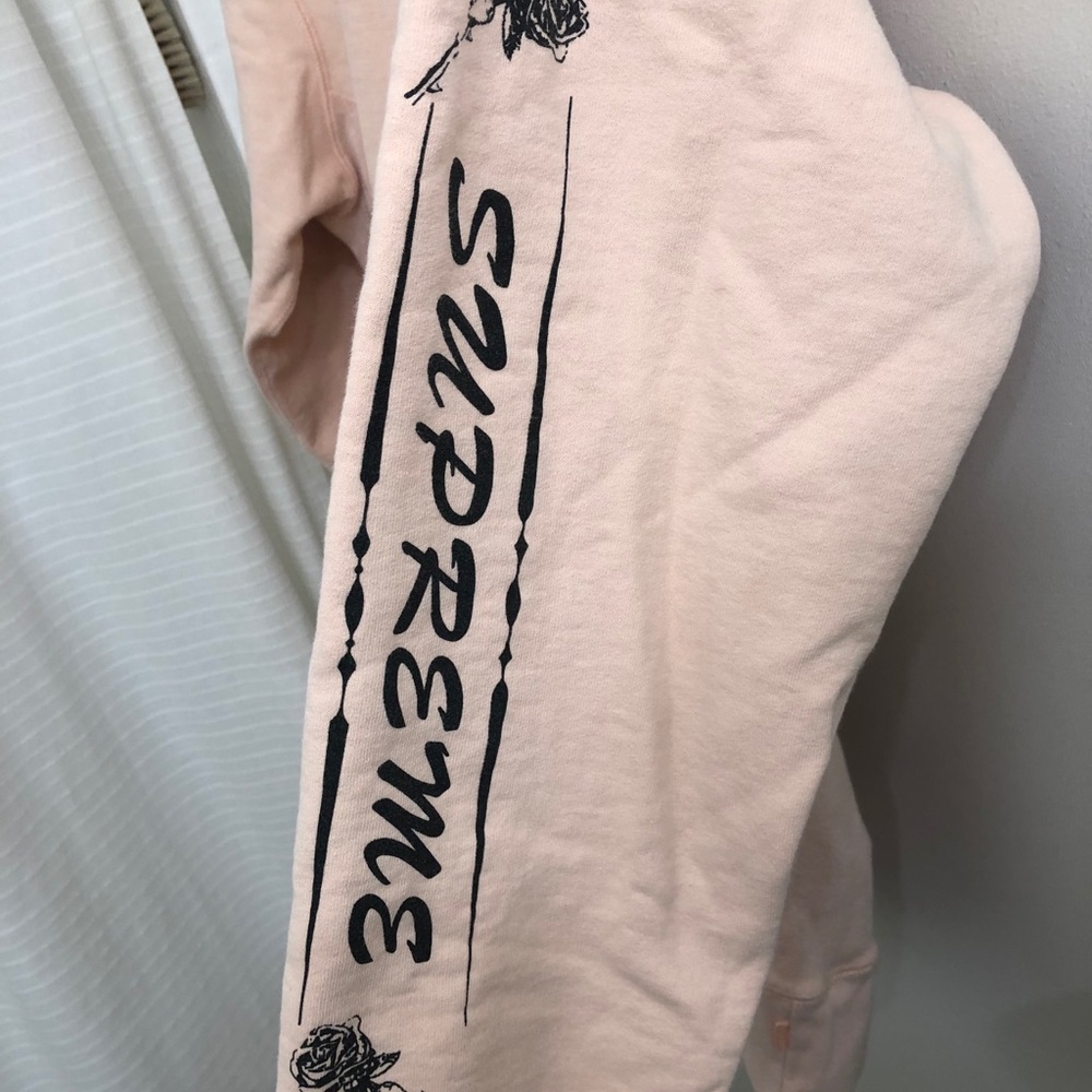 Baby pink Supreme pullover hoodie
